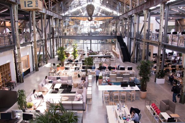 Tech company Gusto opens shoeless office in converted shipbuilding warehouse in San Francisco
