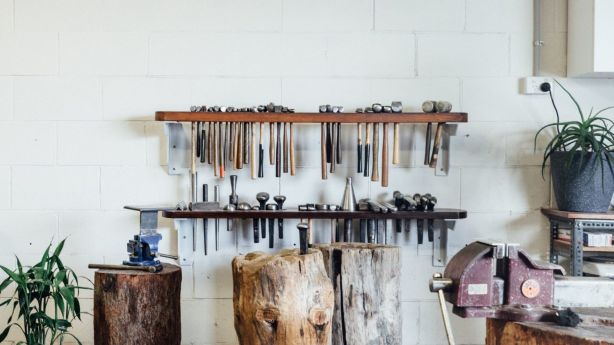 The silversmith has an extensive hammer collection. Photo: Andy Mullins