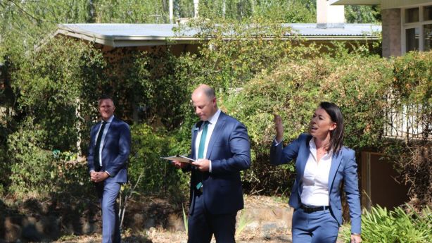 Belle Property listing agent and auctioneer Louise Harget in action. Photo: Lucy Bladen