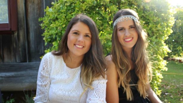 Rachael Cameron (left) earns extra money selling unwanted items online and is saving to buy a house with her sister Natasha (right). Photo: Supplied