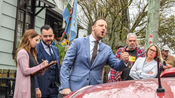 Auctioneer Jon Craven warned the bidders that he wouldn't accept rises below $500, towards the end of the auction. Photo: Peter Rae.