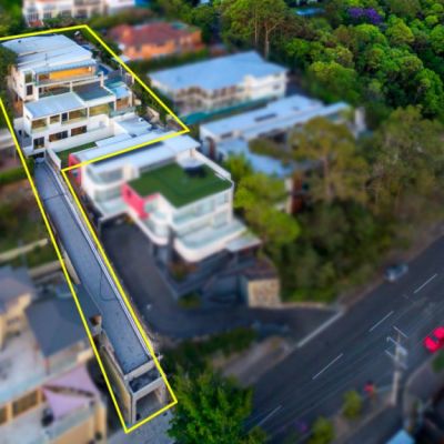 Brisbane mansion has Batman-style secret driveway