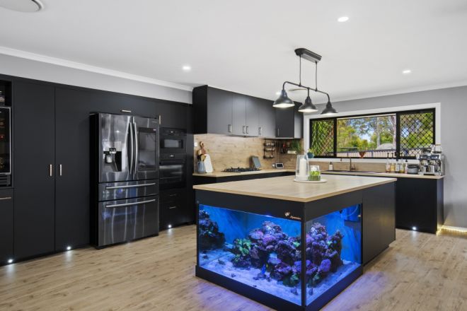 Gold Coast home s show stopping kitchen features a tropical