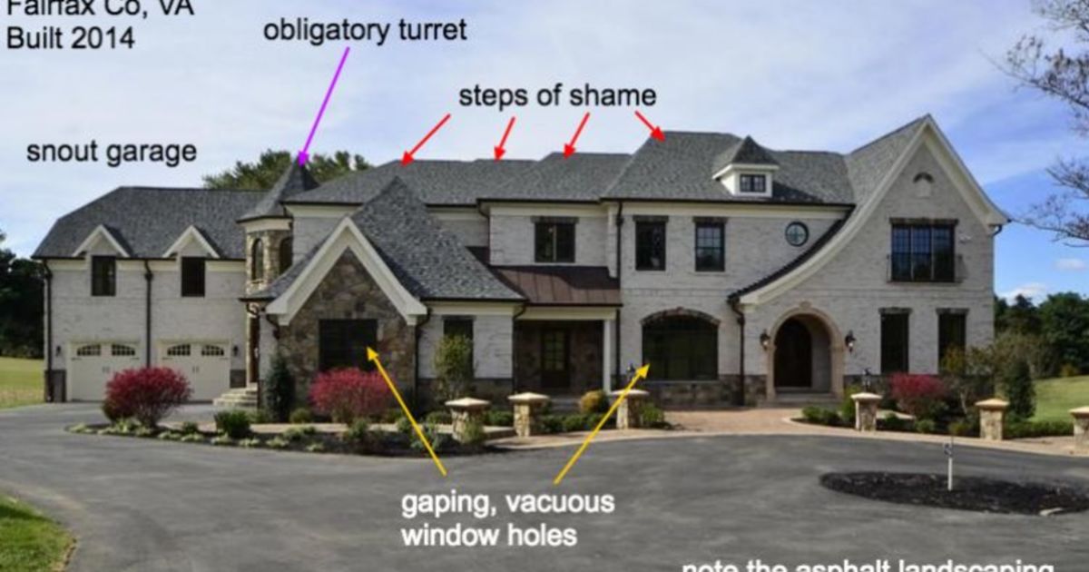 A McMansion with an imposing double-door entrance flanked by oversized columns, showcasing architectural pretension.