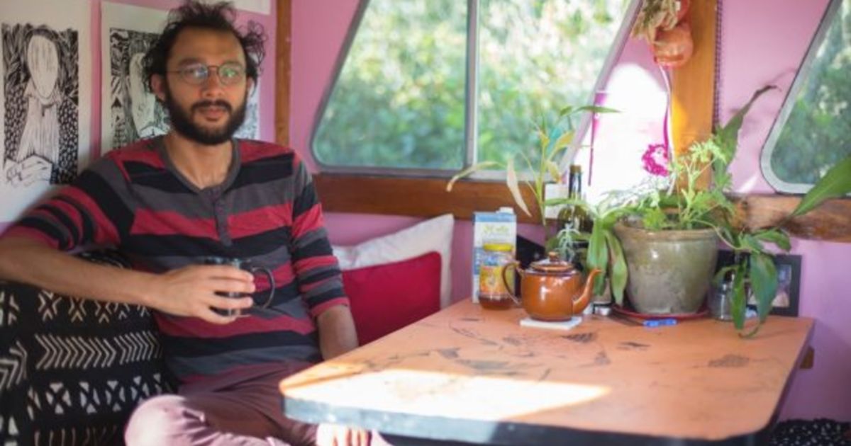 brisbane councillor jonathan sri lives on a houseboat so he can donate half his pay