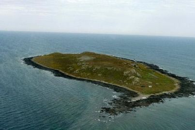 Tasmanian island back on market with higher price tag, after sale fell through