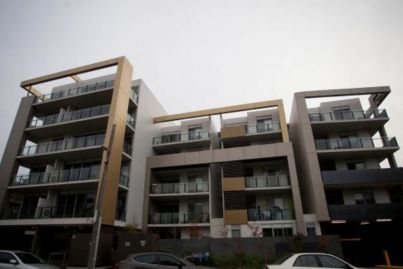 State government lists $95m Parkville apartment block