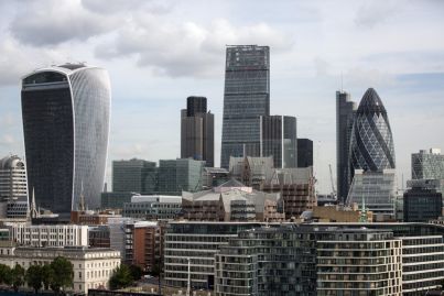 London landlords are hoisting for sale signs on office towers