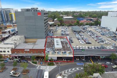 Strathfield arcade built by John Symond's father sells for more than $30m