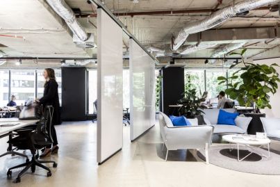 Reconfigure your own workspace layout with sliding whiteboards in this award-winning office