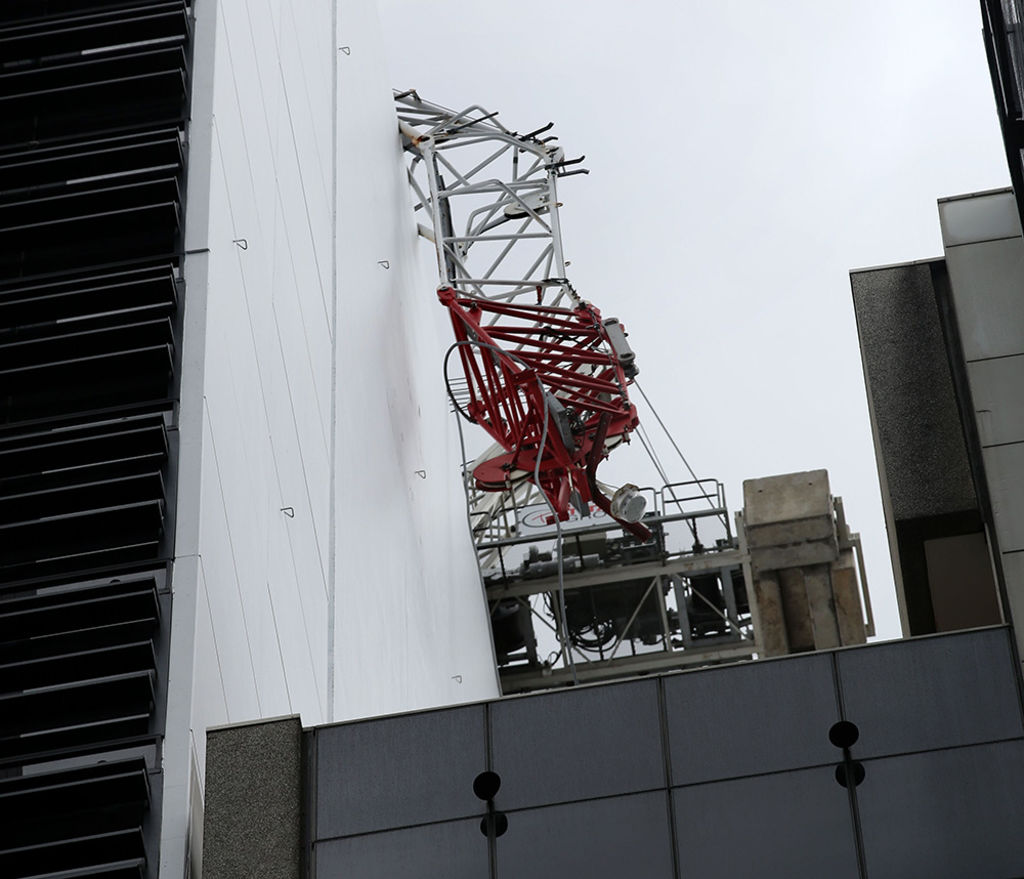 North Sydney crane collapse leaves workers dangling from building