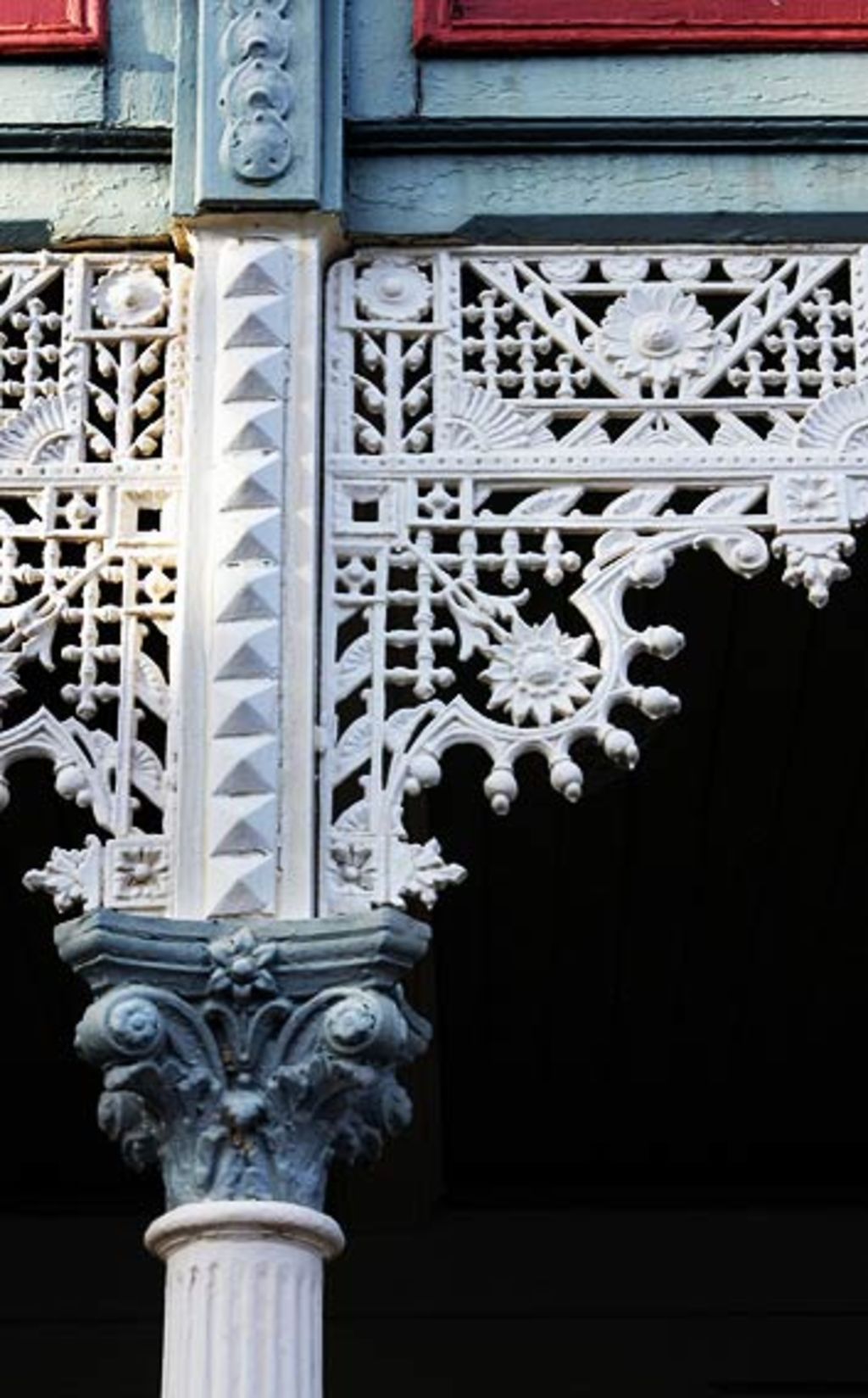Iron lace puts the finishing touch on a period facade.