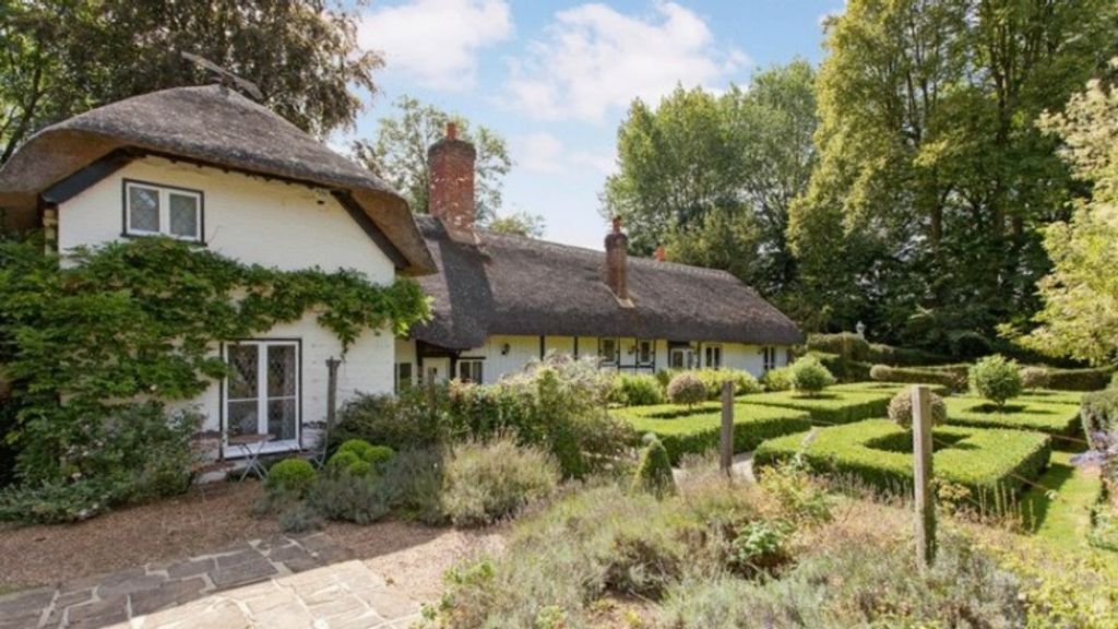 Enid Blyton’s charming thatched cottage is up for sale