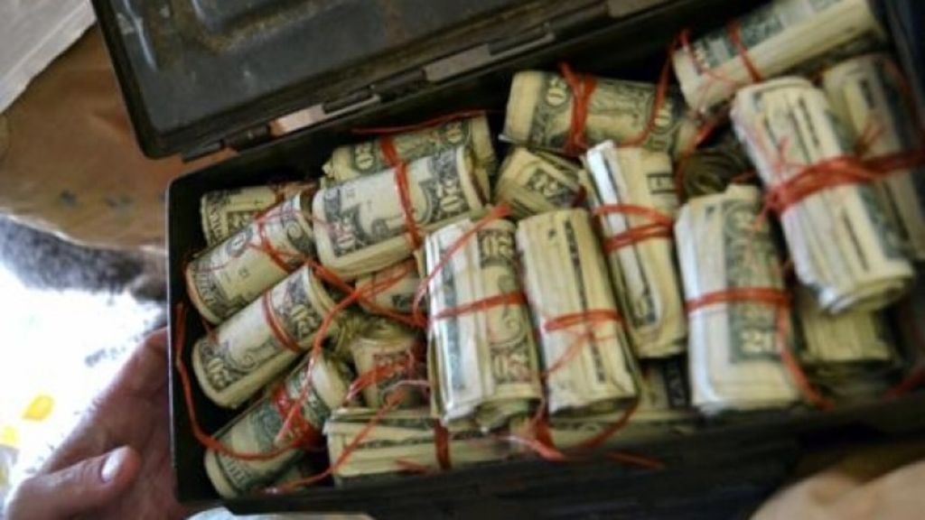 Couple moving into their new home find thousands of dollars hidden in box in attic. Photo: AP Images