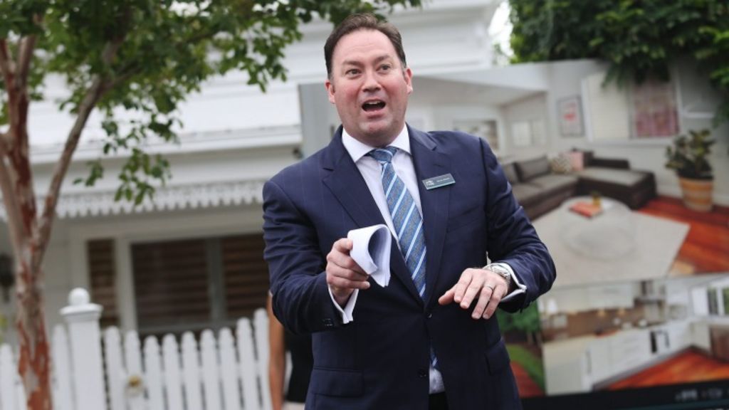 Thinking of buying a property? Familiarise yourself with the lingo. Pictured: Auctioneer Steven Abbott of Jellis Craig in action. Photo: Paul Jeffers