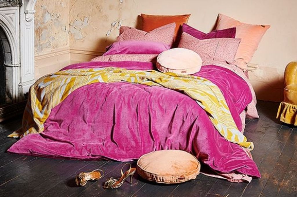 How to style a bed on the floor