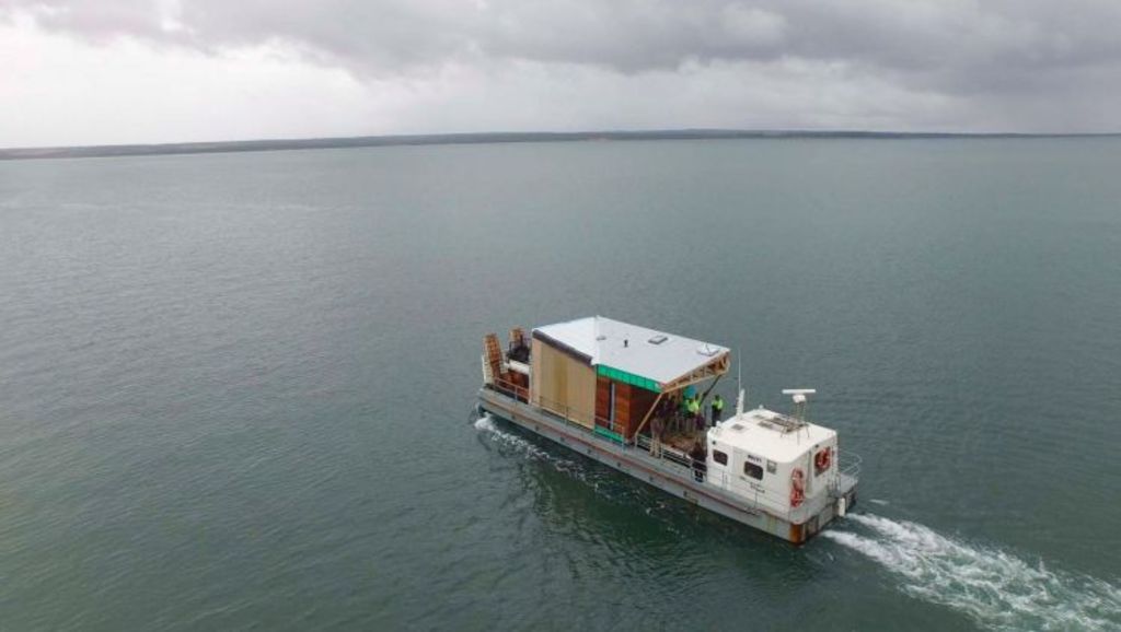 The five sections of the prefabricated home were transported to the island over three days. Photo: Supplied.