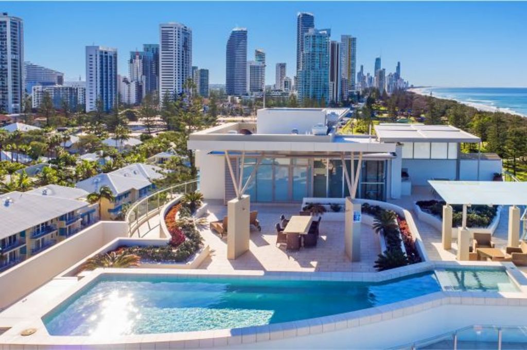 Ex-Coles exec cops multimillion-dollar loss on luxury penthouse