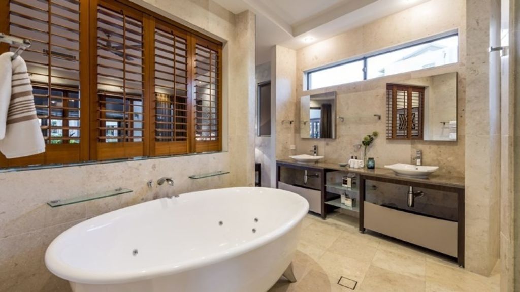 Turn a humble wet room into a sumptuous retreat, such as this luxurious bathroom in Sovereign Islands. Photo: Supplied