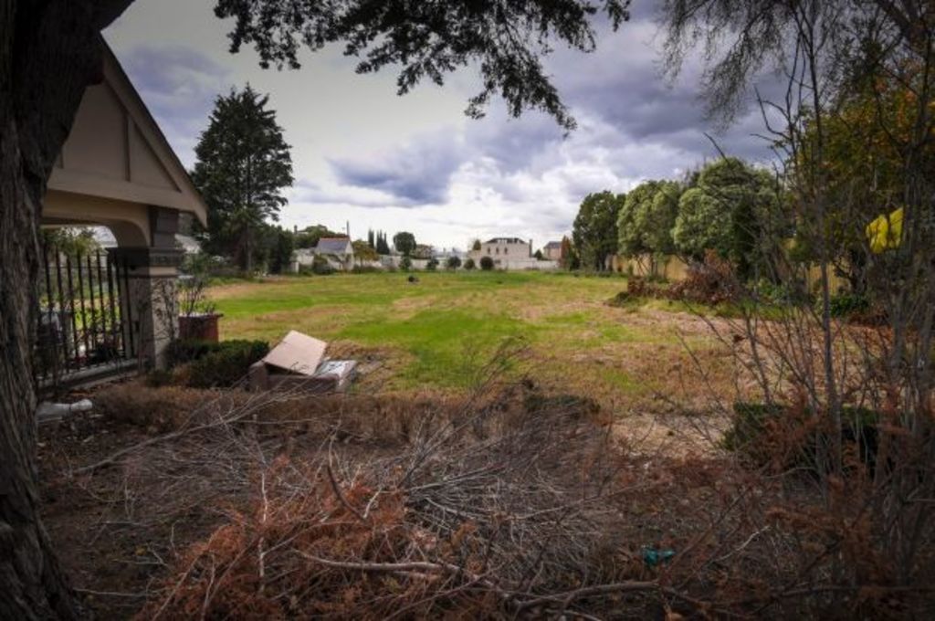 'Ugly paddock': Land sitting empty after a mansion was torn down