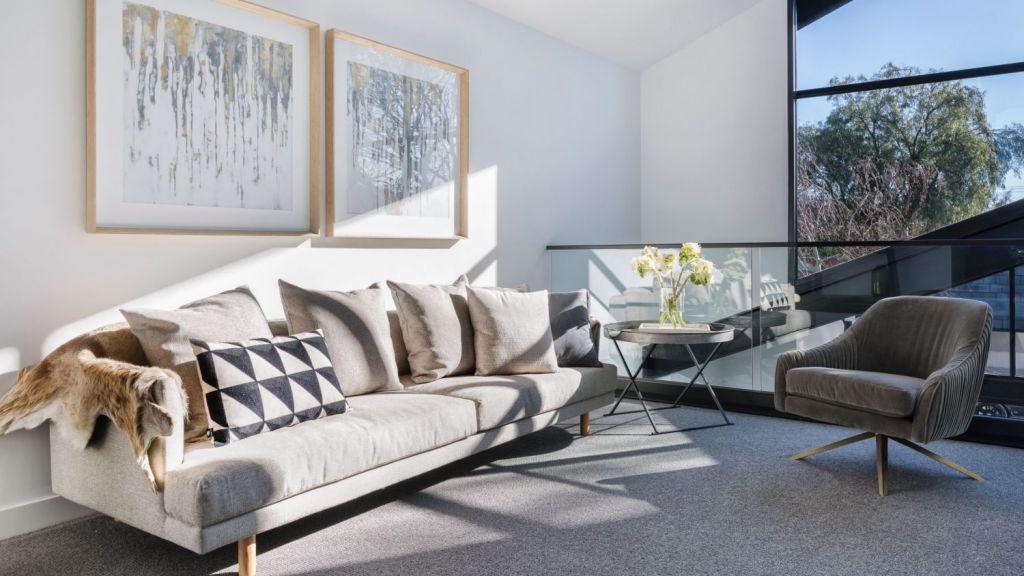 A relaxing lounge area at 71 Cunningham Street, Northcote. Photo: Jellis Craig
