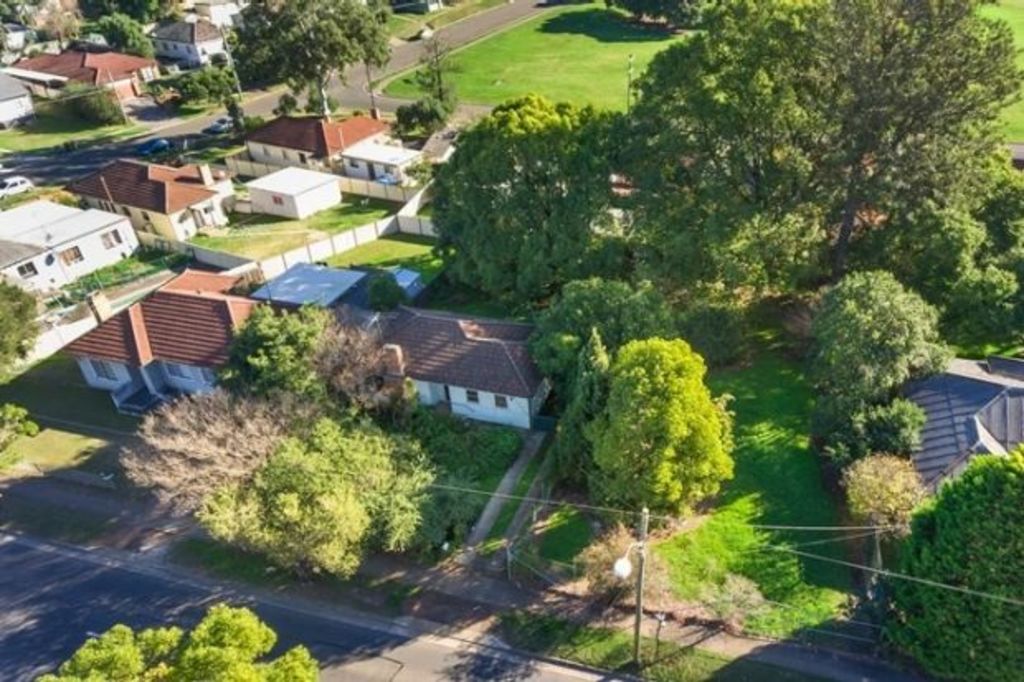 In one suburb home- owners are pairing up with neighbours to sell