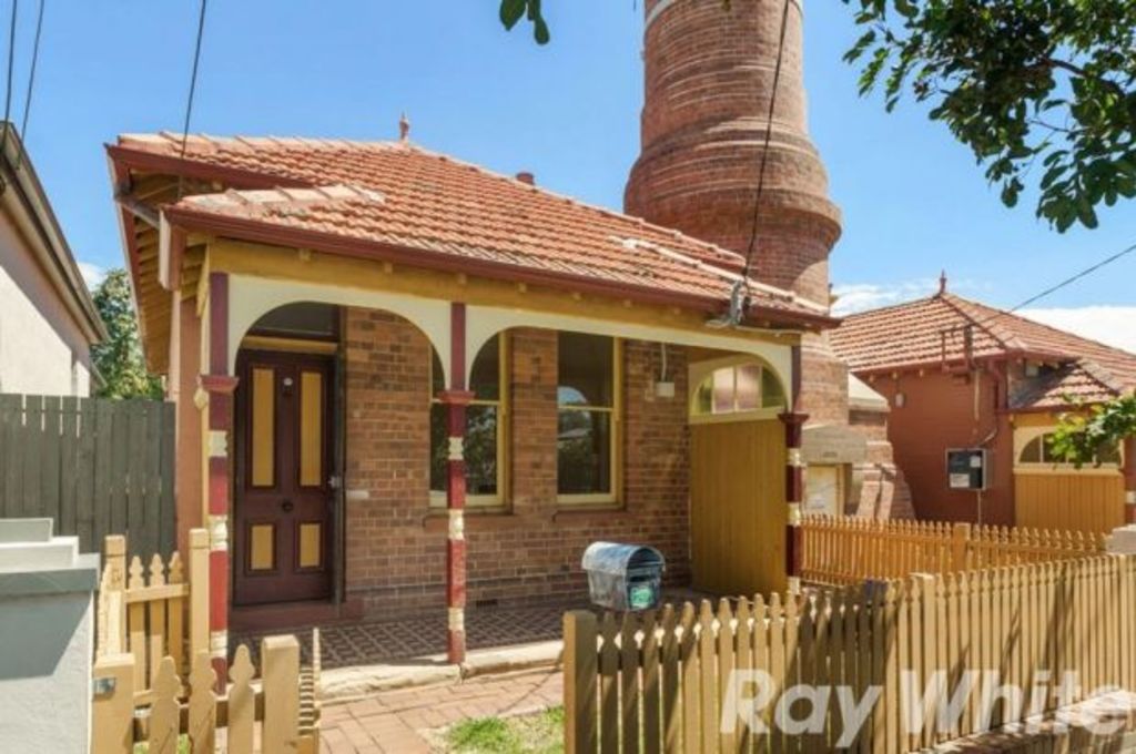 Historic Marrickville cottages with towering sewer vent on the market