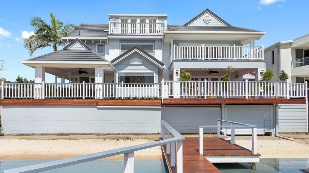 Houses on the Gold Coast have risen again. This waterfront property at 5 Midshipman Court, Paradise Waters, is listed for $3.75 million. Photo: Lambert & Willcox