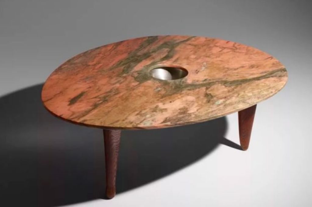 You could buy two houses in Australia for the price of this table