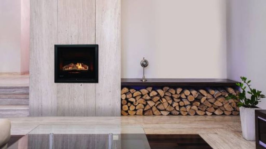 Rinnai's Ember is a compact gas fire that has the option of logs or river stones. Photo: Rinnai