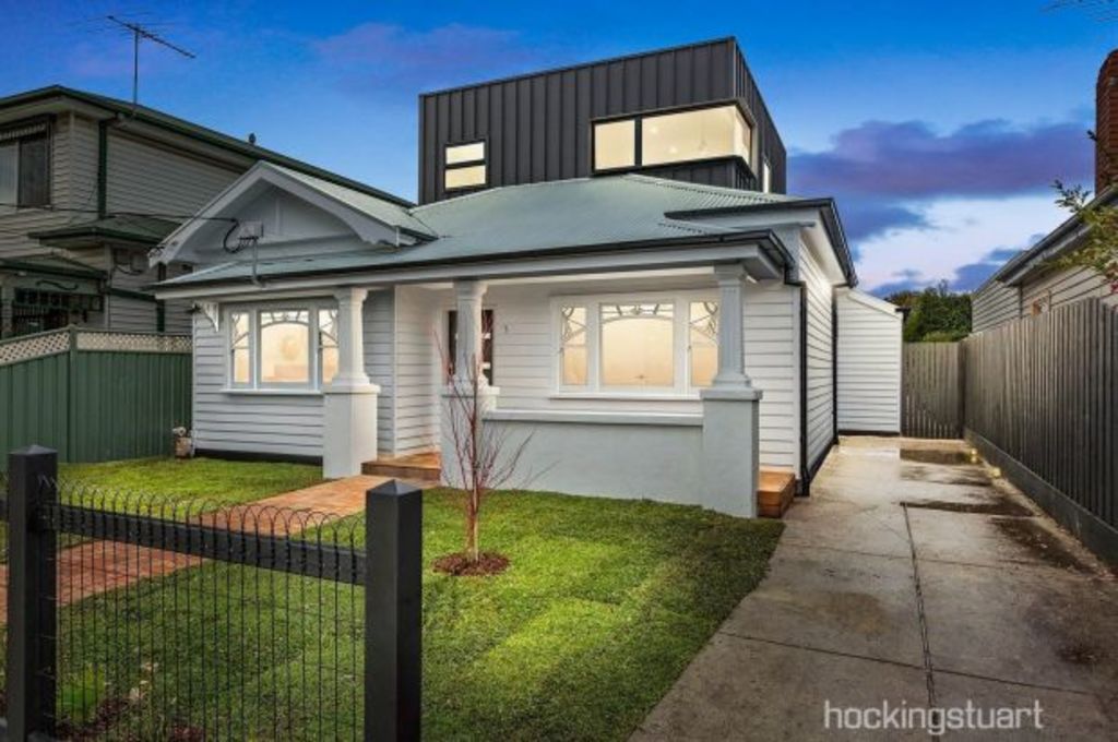 Strikingly modern West Footscray house races past reserve in hot auction