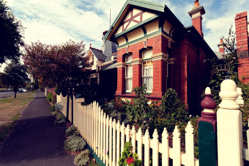 House with white picket fence in Melbourne.