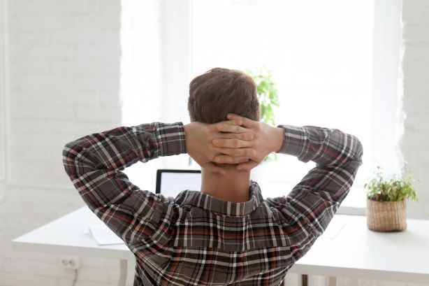 Generic image of a person working on their laptop