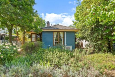 Canberra's house prices are still falling. How did the city get so expensive in the first place?