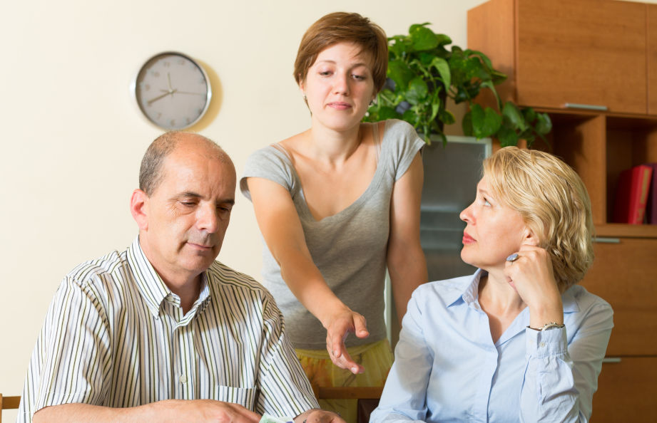 Young adult asking parents for money.