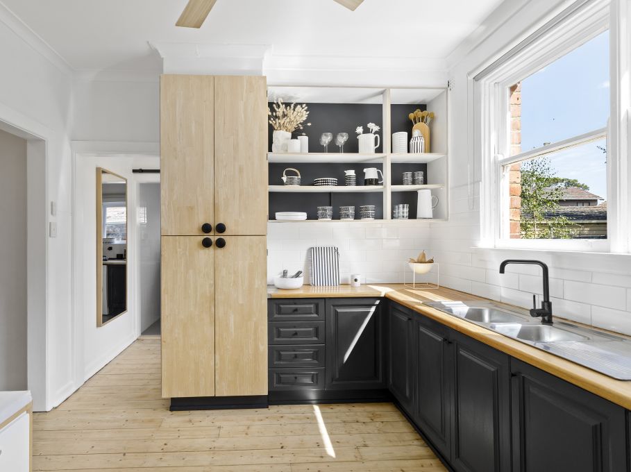 Update benchtops and tapware to make the kitchen a place in which you enjoy spending time. Photo: Woodards