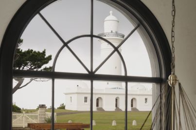 This clifftop home is steps away from one of Australia's oldest lighthouses