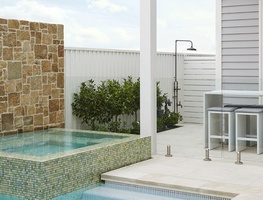 The key to designing a smaller pool space is to make sure it's practical and functional. Photo: Mint Design