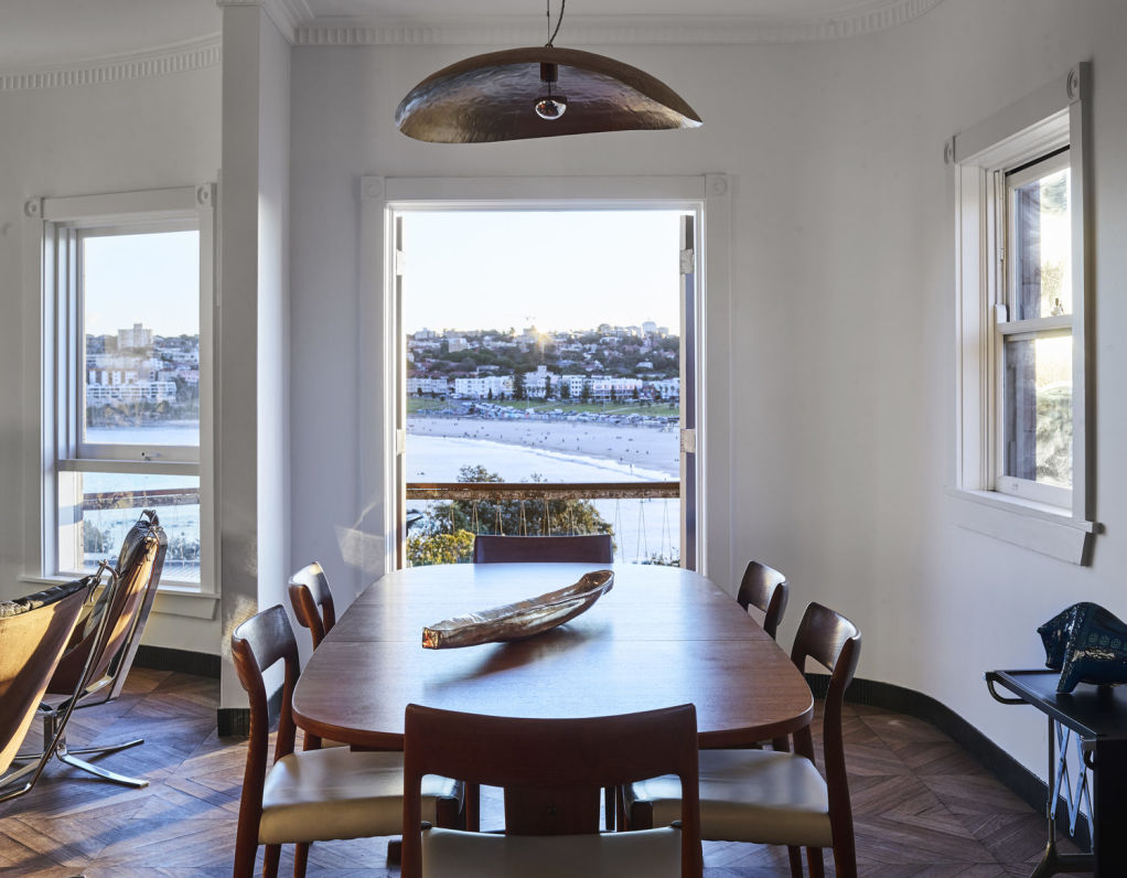 The block of four apartments on Brighton Bloulevard is set across the road from a beachside park.