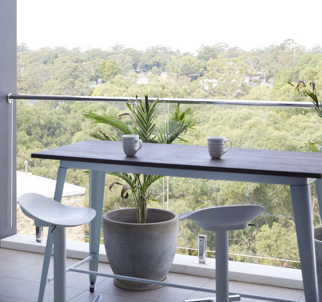 Young couple Noleen and Des upsized to a three bedroom apartment with a gorgeous view on Sydney's lower north shore. Photo: Nicky Ryan