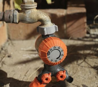A tap timer is a smart choice when using a lawn sprinkler.