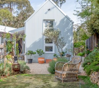 Tall windows in a tall gabled wing are perfectly proportioned but really there for privacy. Blue Mountains Mum's house.