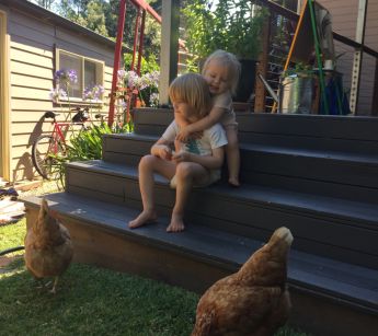 Rosie Chase and James Grieve's kids Charlie and Ella love interacting with their backyard chooks.