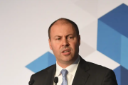 'Take it easy': Treasurer banking on tax cuts saving Australian retailers