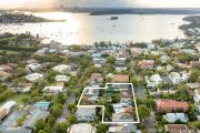 Twelve Sydney neighbours combine their properties to sell for colossal $165 million