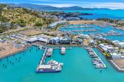 New owners of Port Airlie marina sail into the sunset $20.7 million lighter