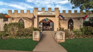 A castle-shaped liquor shop on a mountain? Wine not