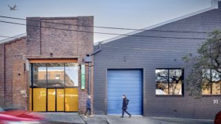 Can you guess what lurks behind these roller doors? Can you guess what lurks behind these roller doors?