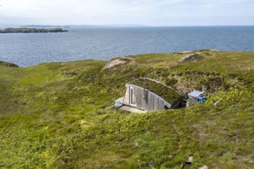 Answer the call of nature outdoors at this $1 million island