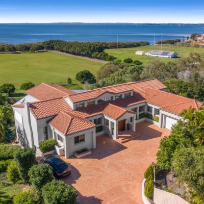Buyers fly in for bayside mansion